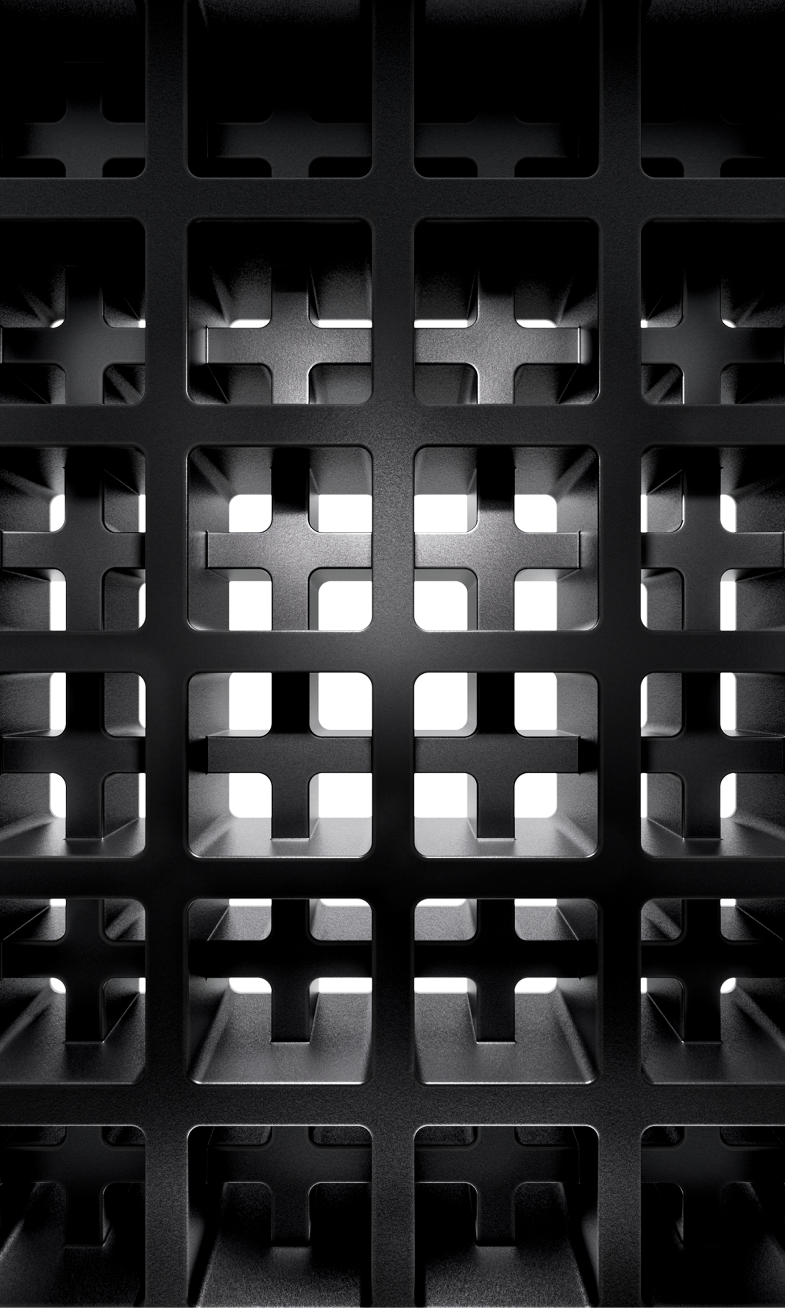 Close-up of black grid pattern with light through center