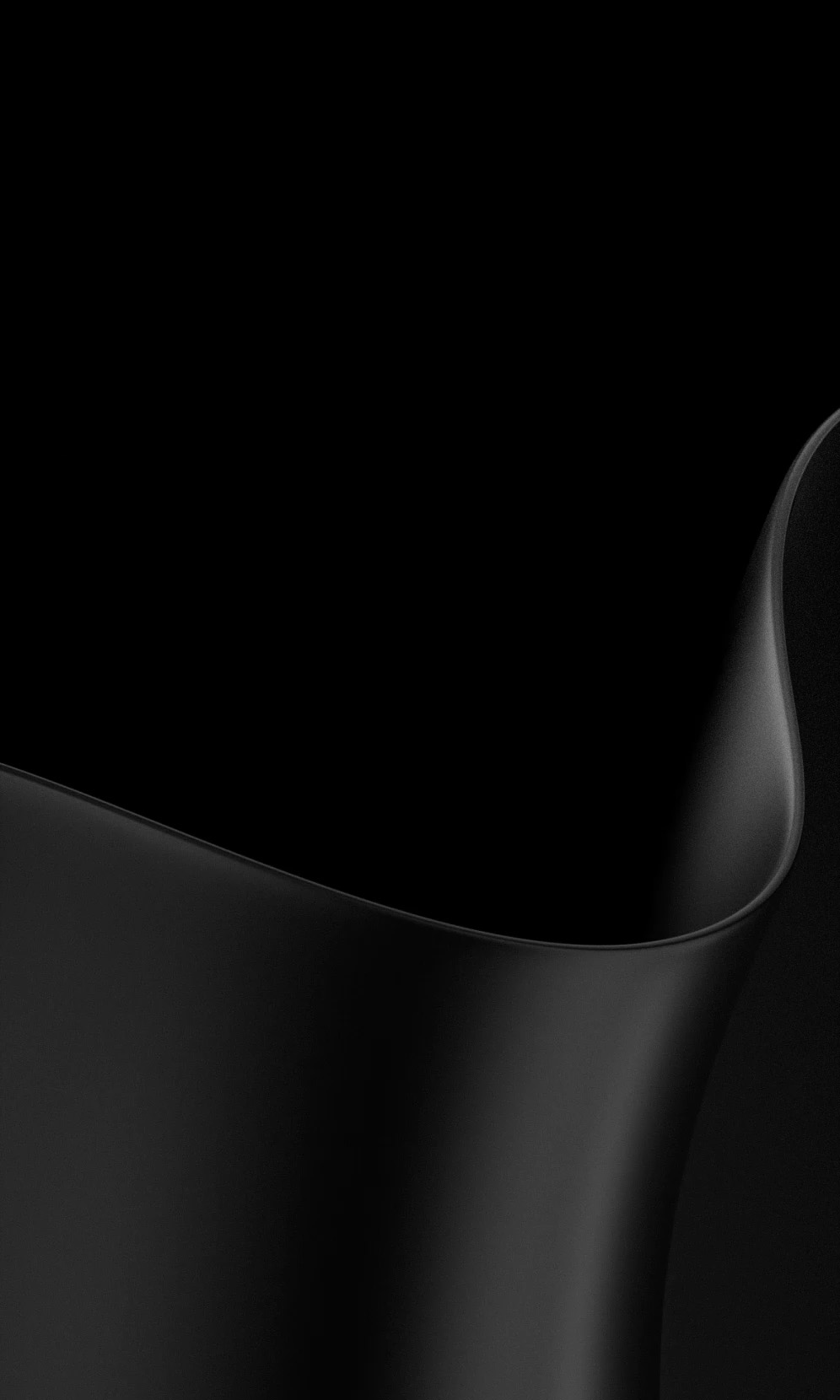 Nærbillede af sort Surface Laptop med buede, matte metalkanter.