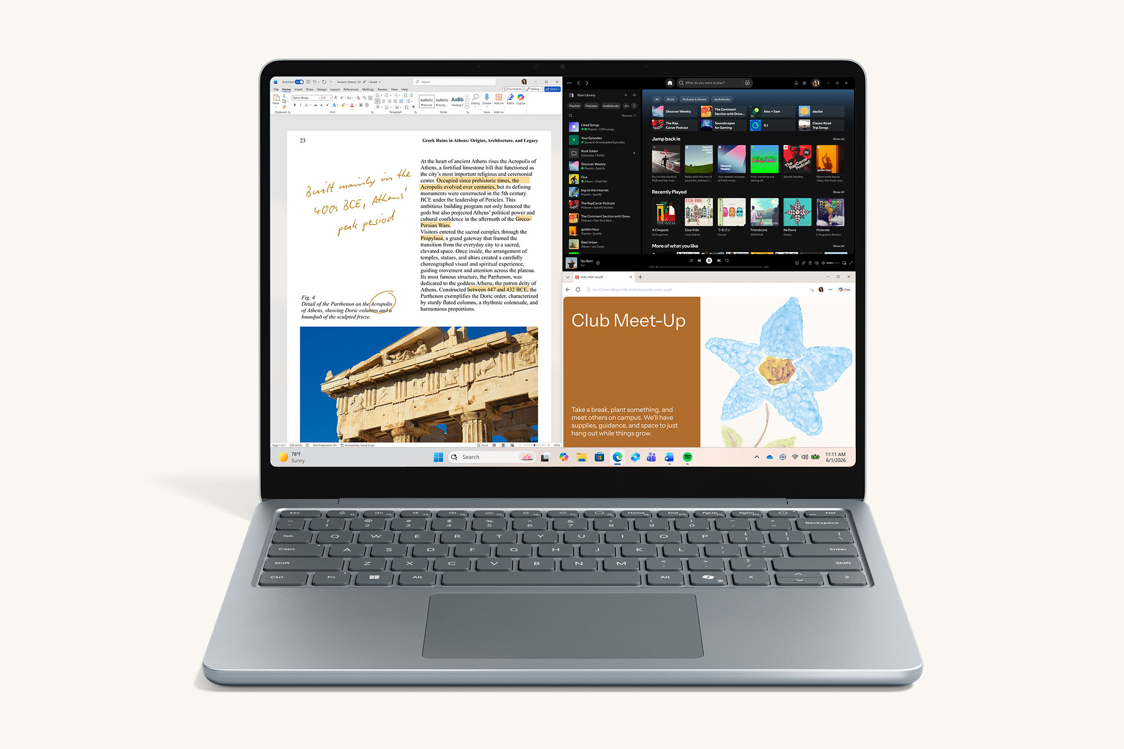 Ocean 13-inch laptop displaying a split-screen view with document editing, music app, and web content