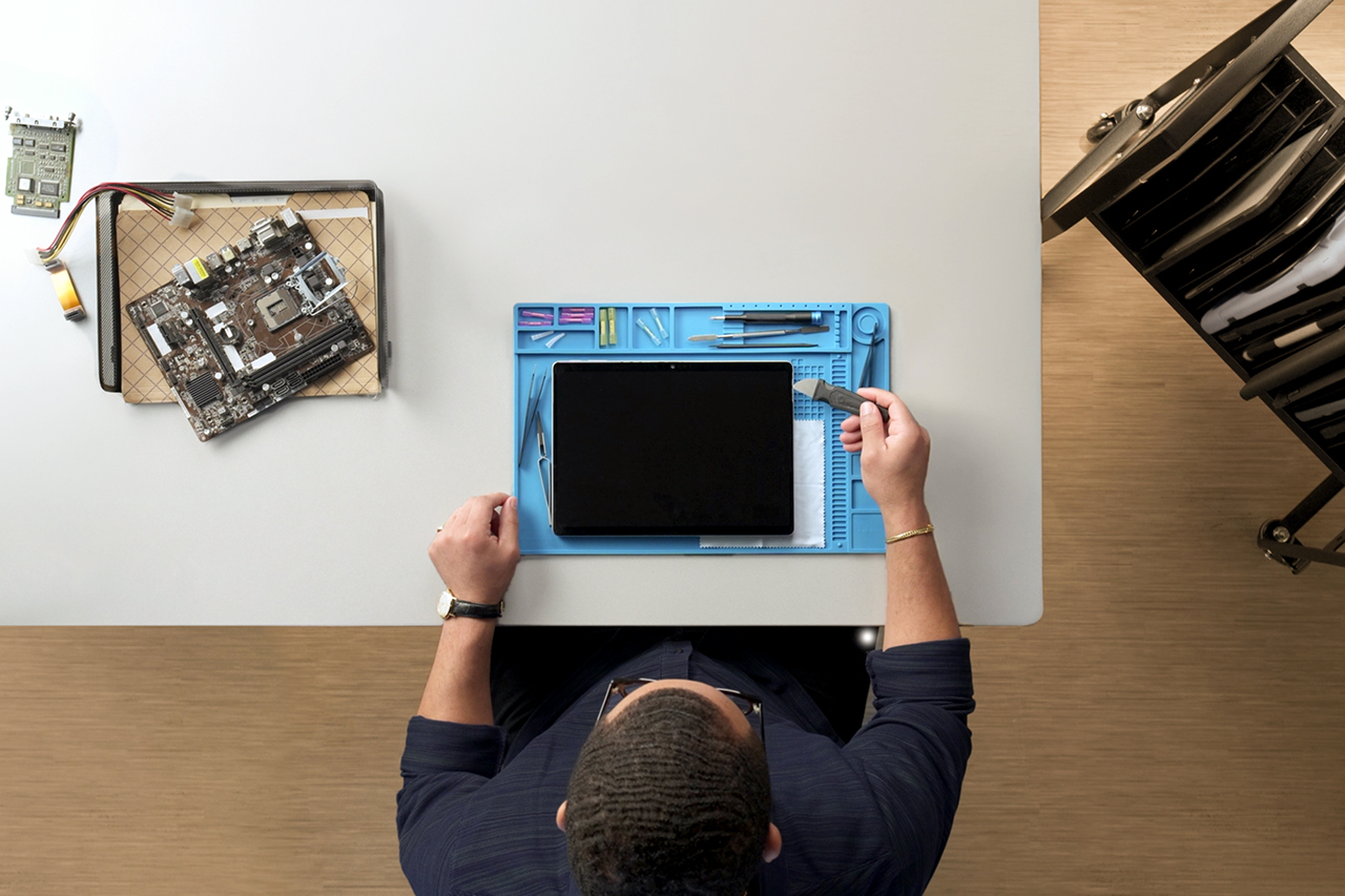 Top Down view of a person working on their Surface device.