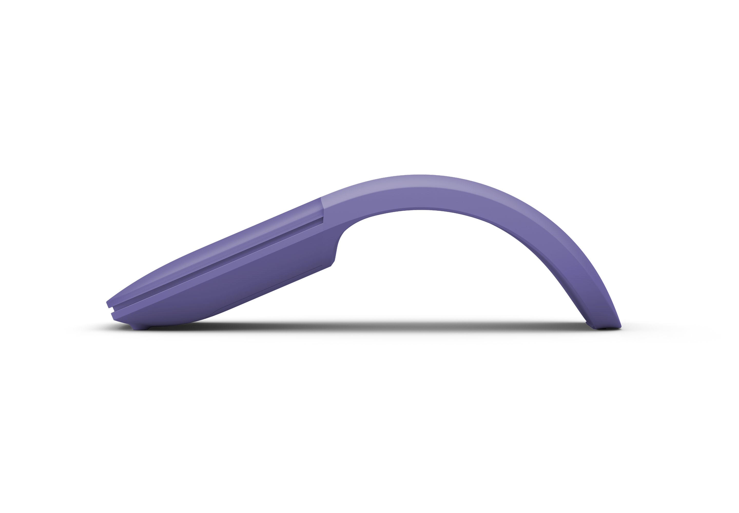 Side profile of a curved violet Surface Arc Mouse shown against a dark background, highlighting its slim, arched design