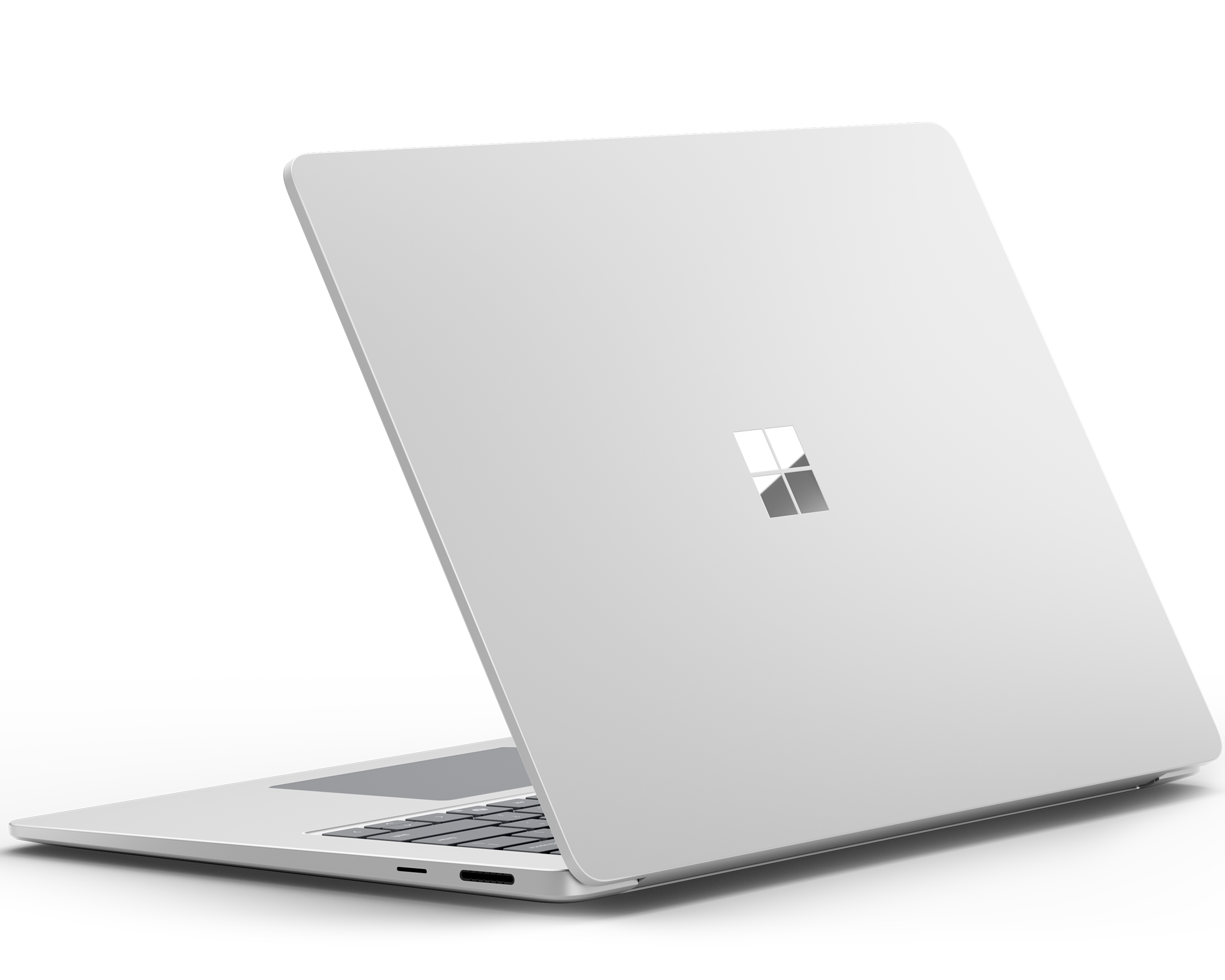 Un Surface Laptop Platino parzialmente aperto su sfondo chiaro.