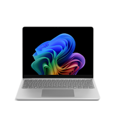 Front view of a platinum Surface Laptop 13 inch open with a Windows rainbow bloom displayed on the screen