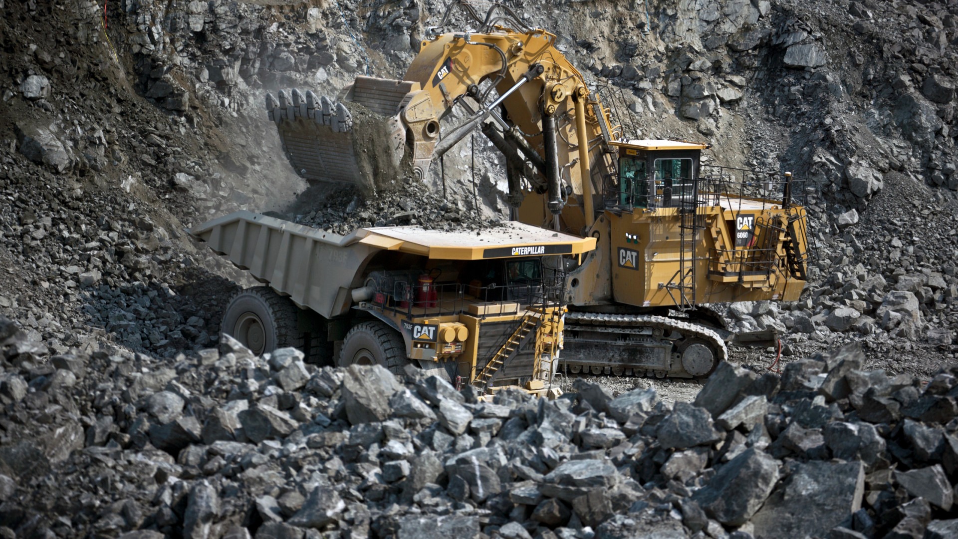 Hydraulic Mining Shovel (HMS) loading Off Highway Truck (OHT)