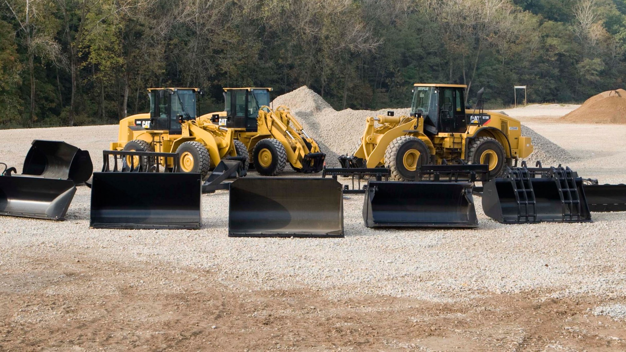 Wheel Loaders with Buckets and Couplers - Caterpillar