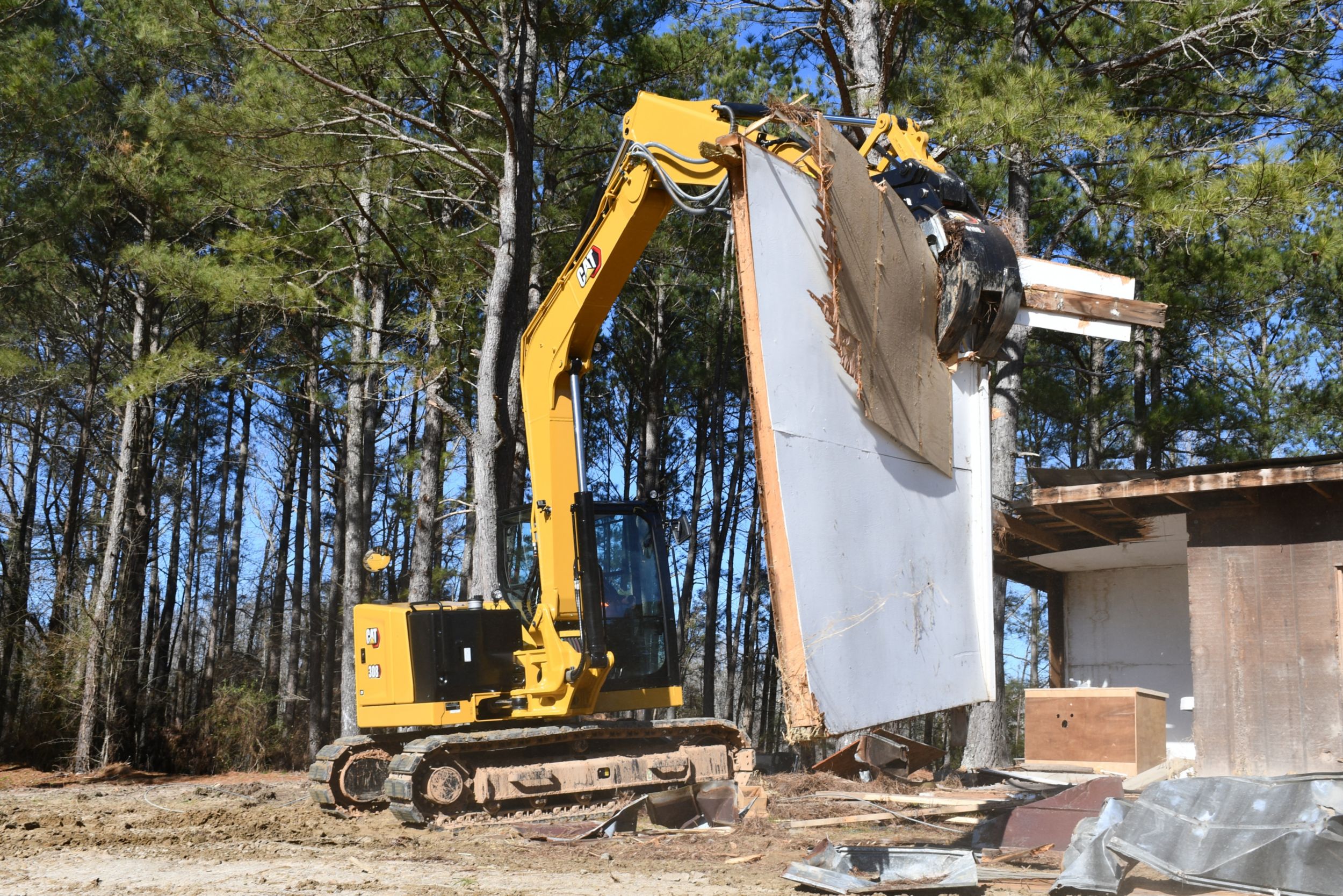 Contractors Grapple on 308 Excavator