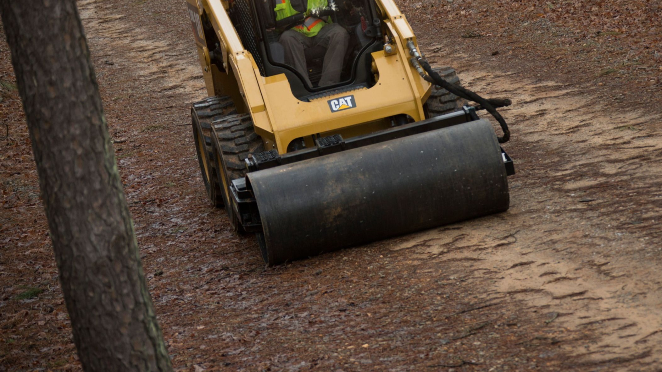 Skid Steer Loader with Compactor Roller