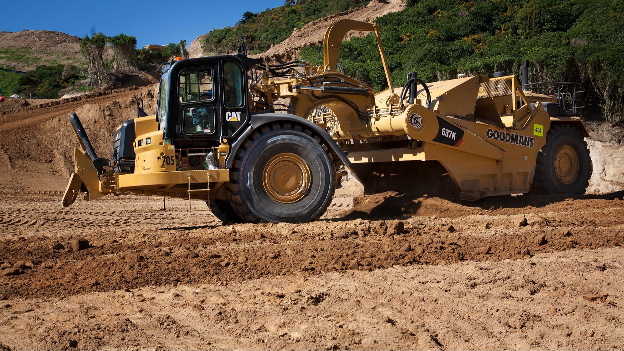 Goodman Contractors Cat 637K Scraper