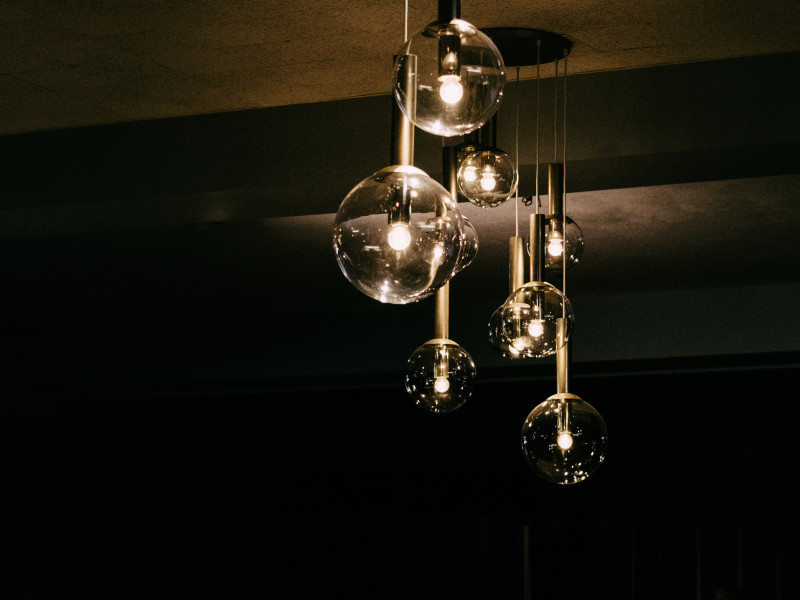 Image of suspended spherical transparent pendant lights