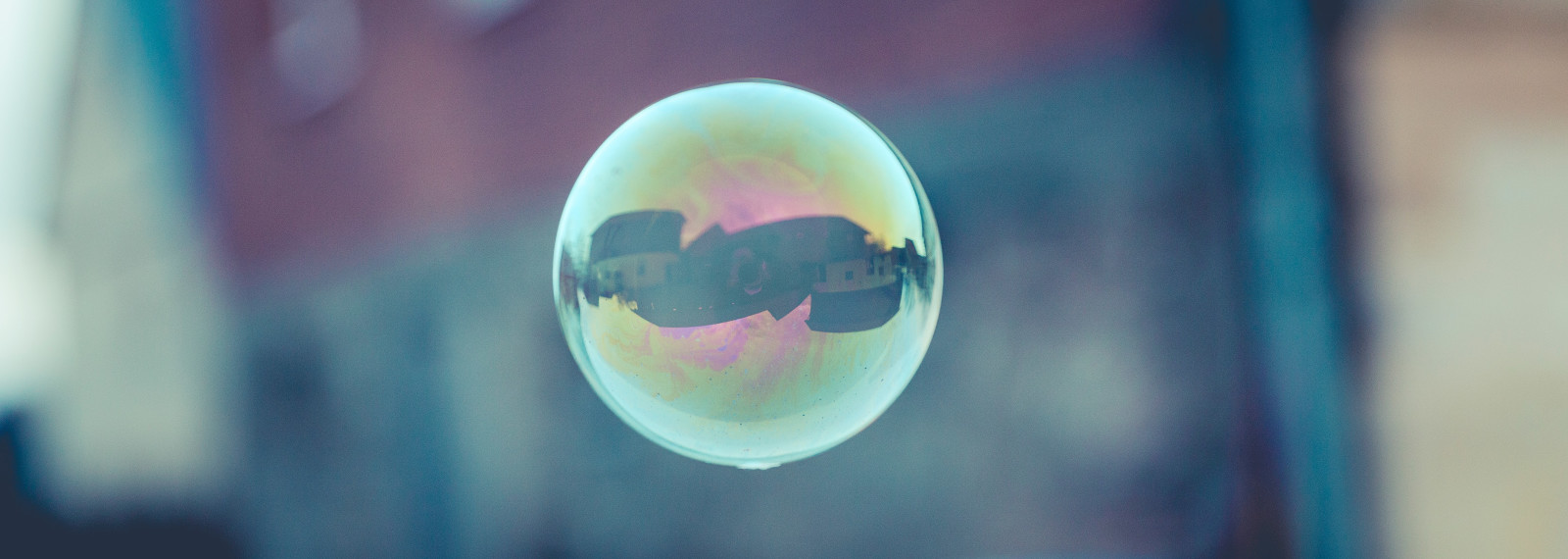 Image of a bubble floating though the sky