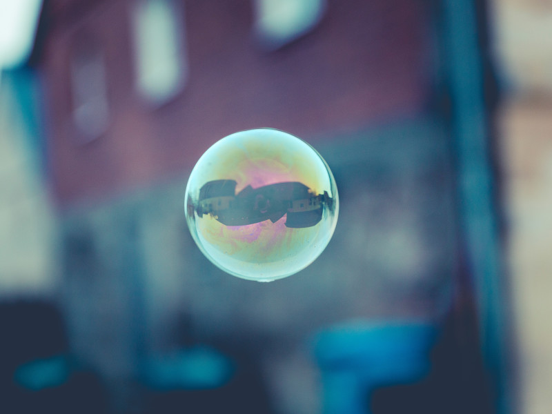 Image of a bubble floating though the sky