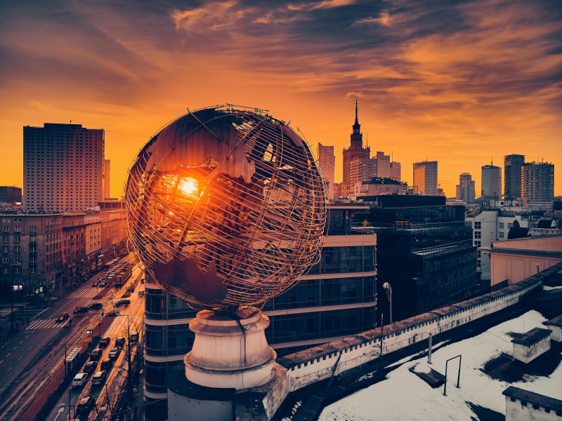 View of a spherical globe set amongst a city skyline
