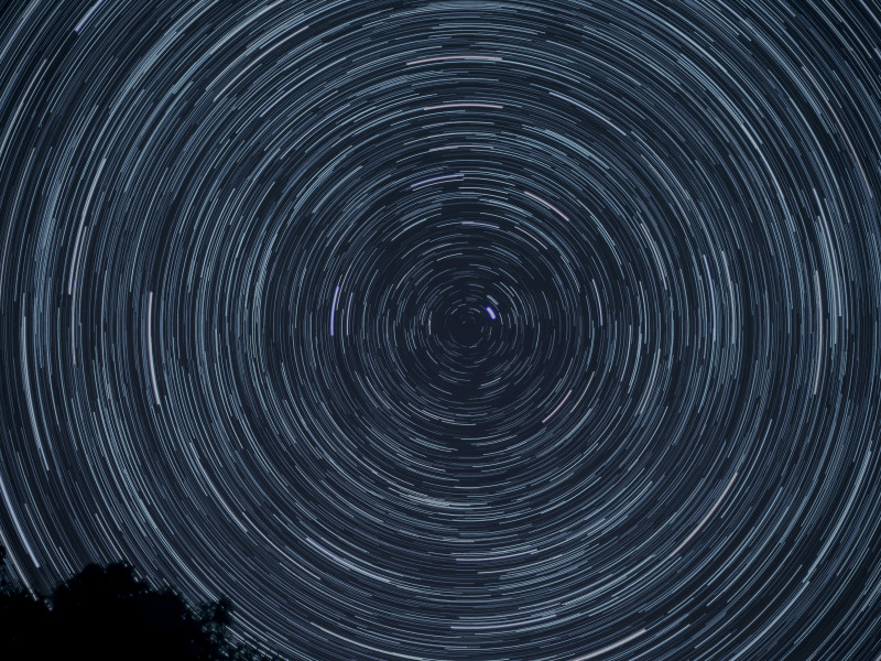 Image of a digital swirl pattern in the sky