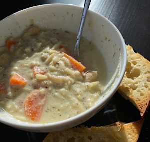 white beans, carrot and orzo in a lemony broth
