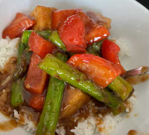 red peppers, asparagus and tofu tossed in spicy honey sauce over rice