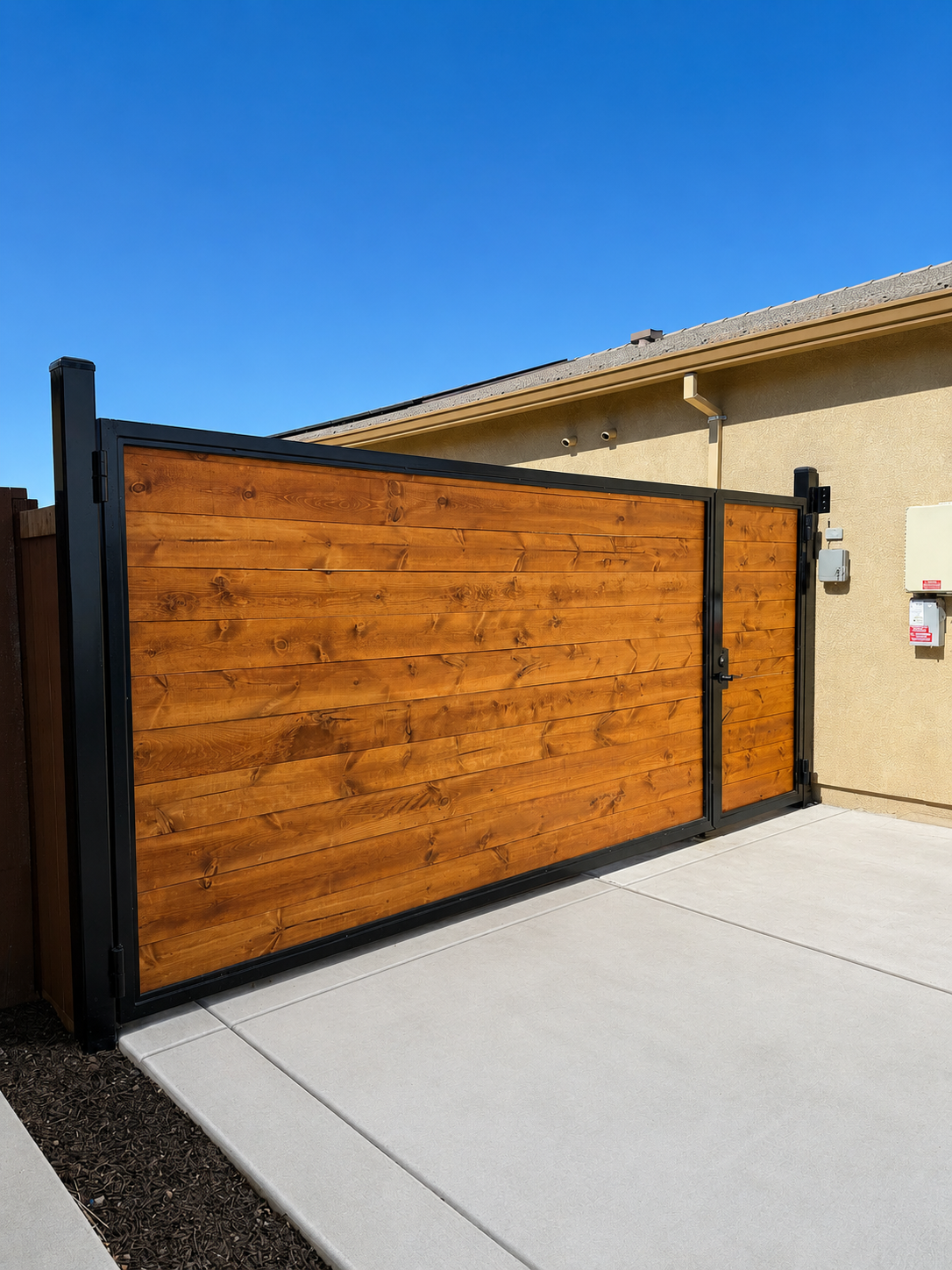 Custom Cedar & Steel Driveway Gate