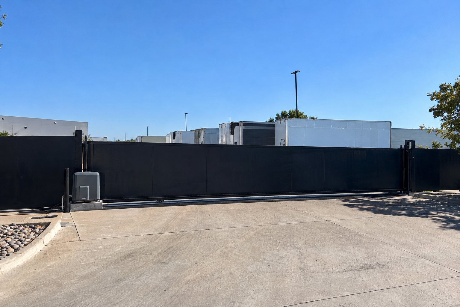 Automated slide gate securing the entrance to a Sacramento truck yard