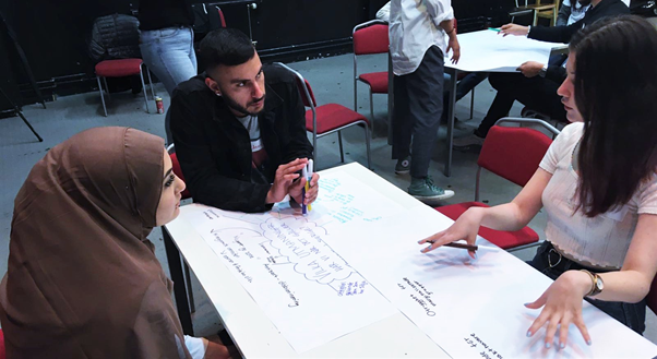 Above: three participants in the event ’Our Sweden’ on the 17 June are discussing particular challenges they see in relation to one of the themes of the day