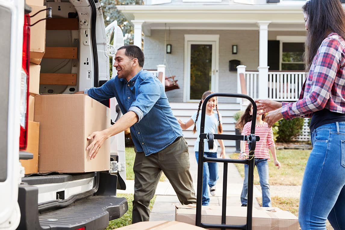 Family unloading a moving truck 