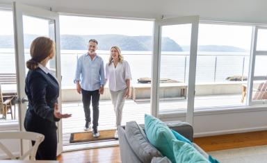 Couple touring a potential new home