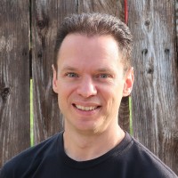 Headshot photograph of Brian Cahill, Head of IT at Frogslayer