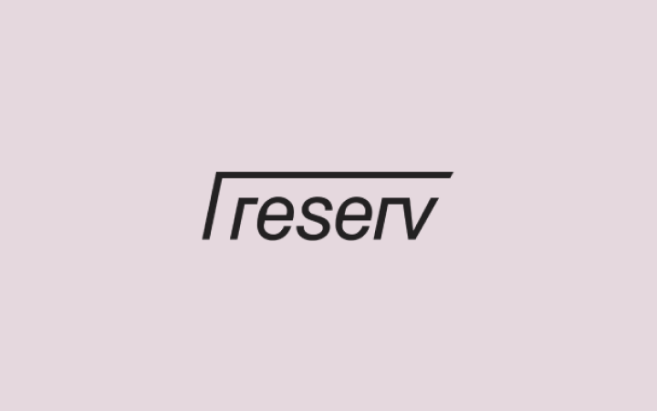 Reserv logo in minimalist black text on a light pink background.