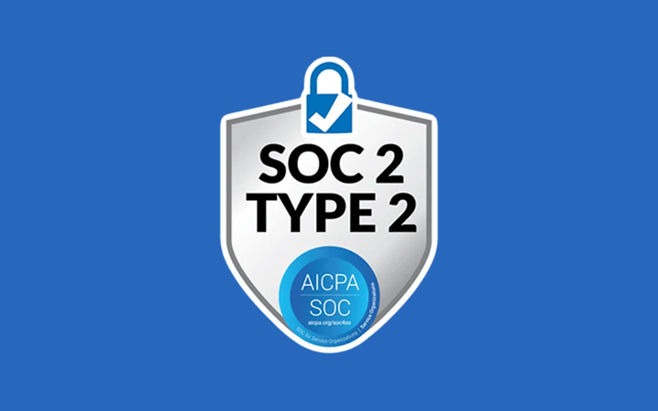 Silver shield-shaped SOC 2 TYPE 2 certification badge with padlock icon and AICPA SOC seal on blue background.