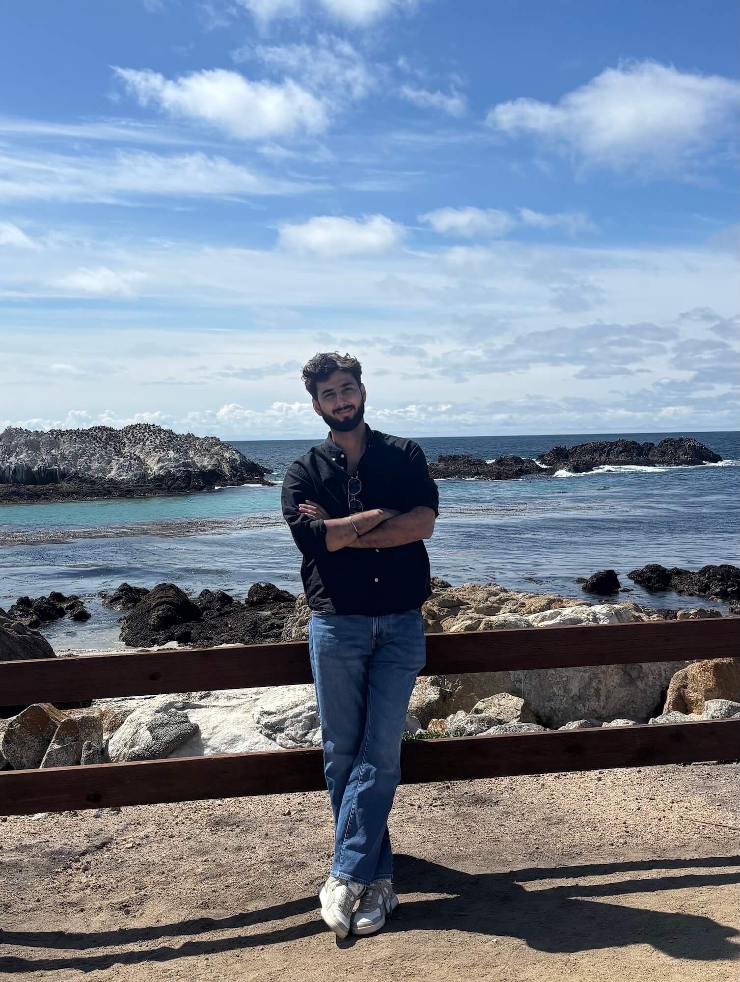 Rippler Sumit Vohra standing at the beach in sunny weather. 