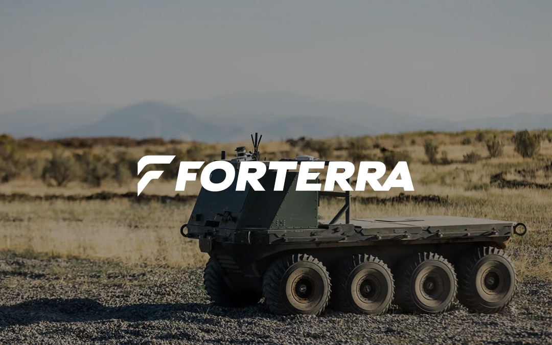 Forterra logo over a photograph of an autonomous vehicle in the desert