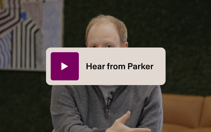 Photograph of Rippling CEO Parker Conrad with a play button and text that says "Hear from Parker"