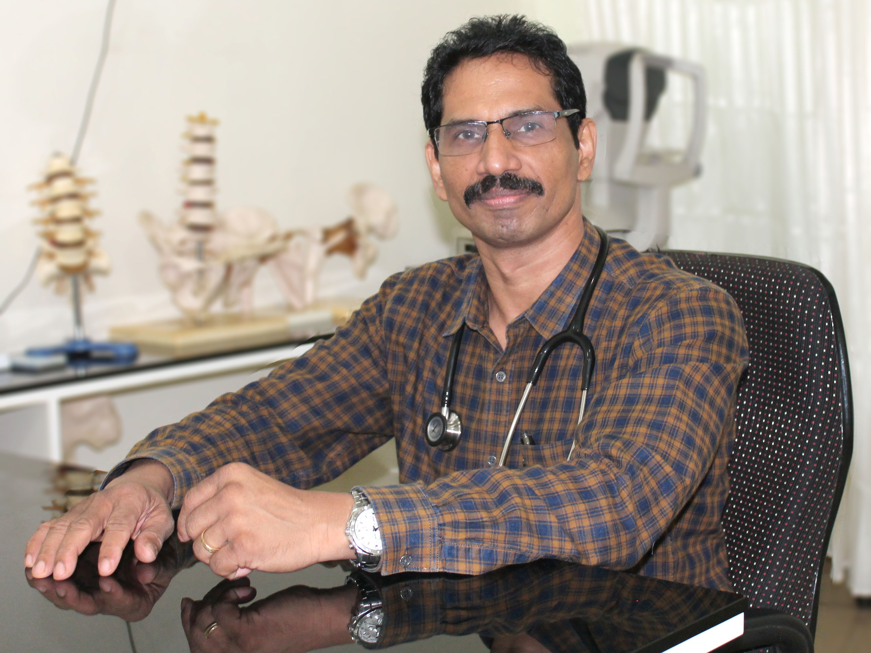 Dr. Reji Thomas