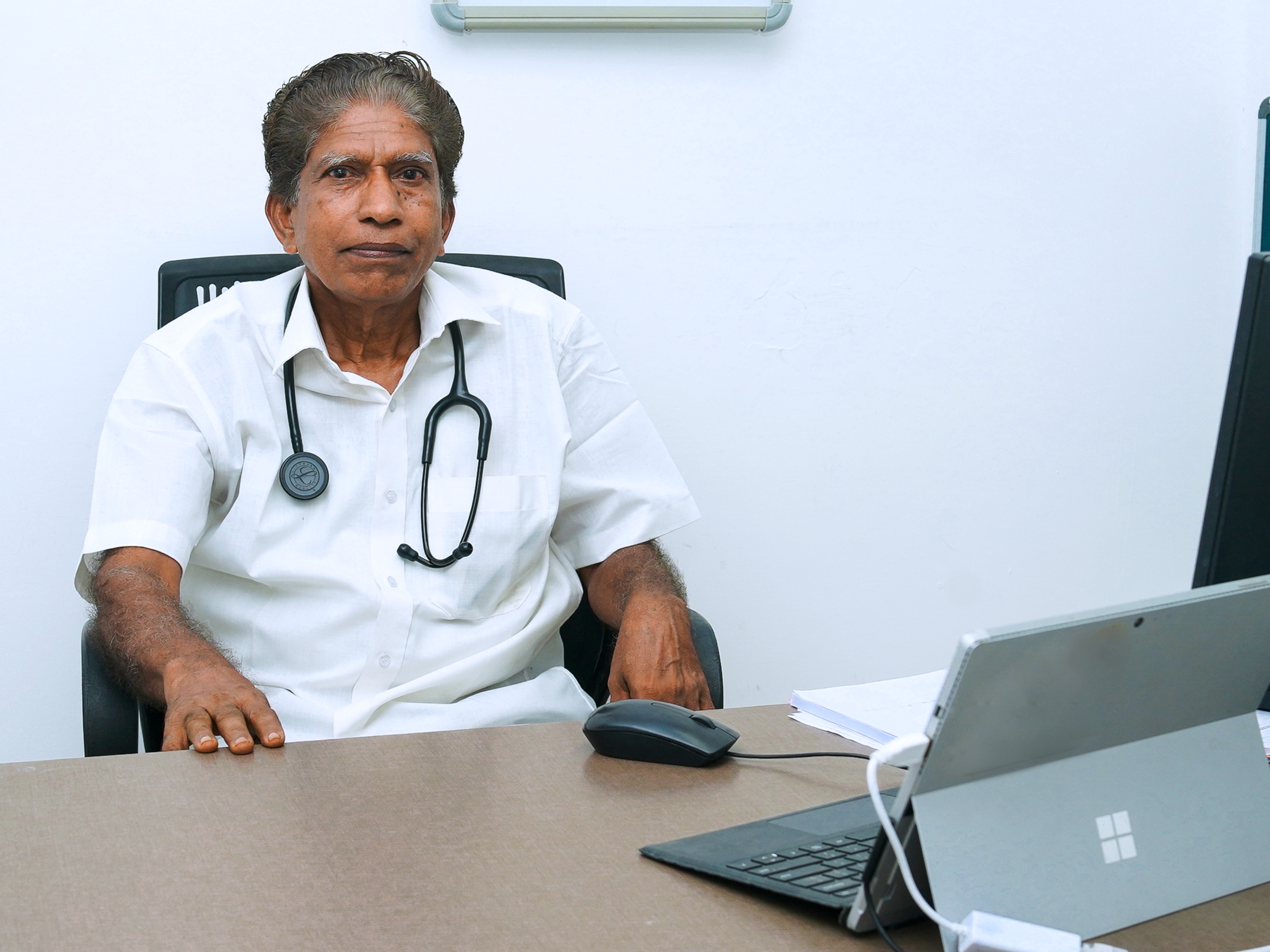 Dr. E K SATHYANJI