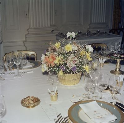 Table Settings and Floral Arrangements for Dinner in Honor of the King of Morocco, Hassan II in 1963. Photo courtesy of John F. Kennedy Presidential Library and Museum.