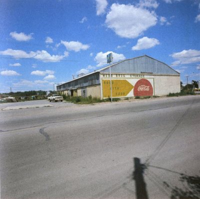 South facade of east building from US Highway 90. Photo 1973.