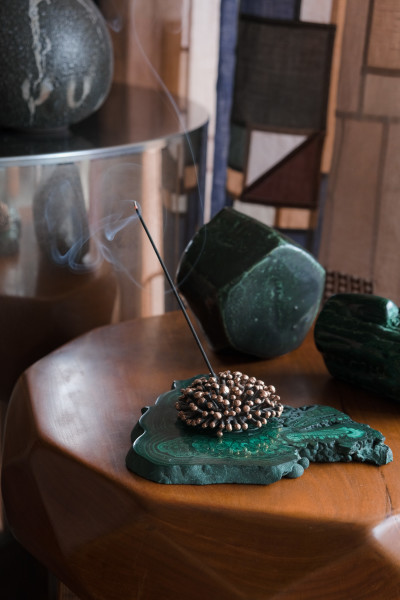 Our own sandalwood incense burning in a Sea Urchin holder by Lisa Eisner