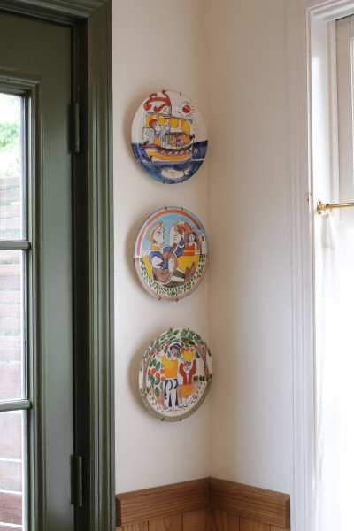 Decorative plates in kitchen corner