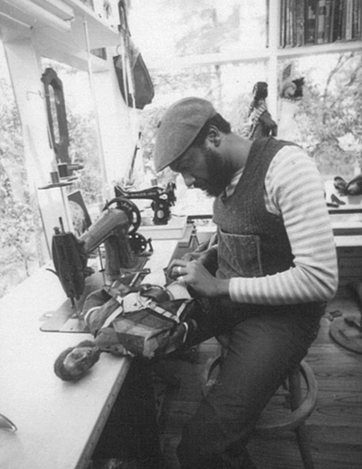 John Outterbridge making a soll in his Fair Oaks studio, Altadena 1972 via International Review of African American Art