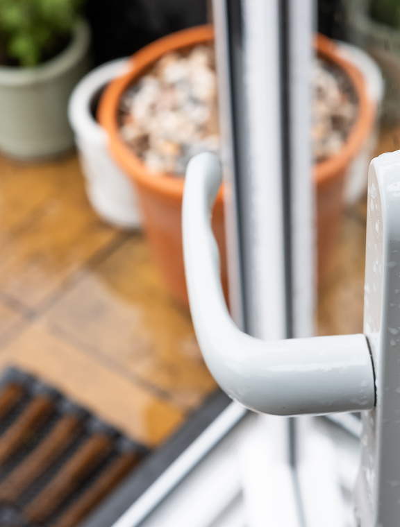 Side view of the Kasa Smart Plug Mini in a dual outlet, leaving space for a second plug.