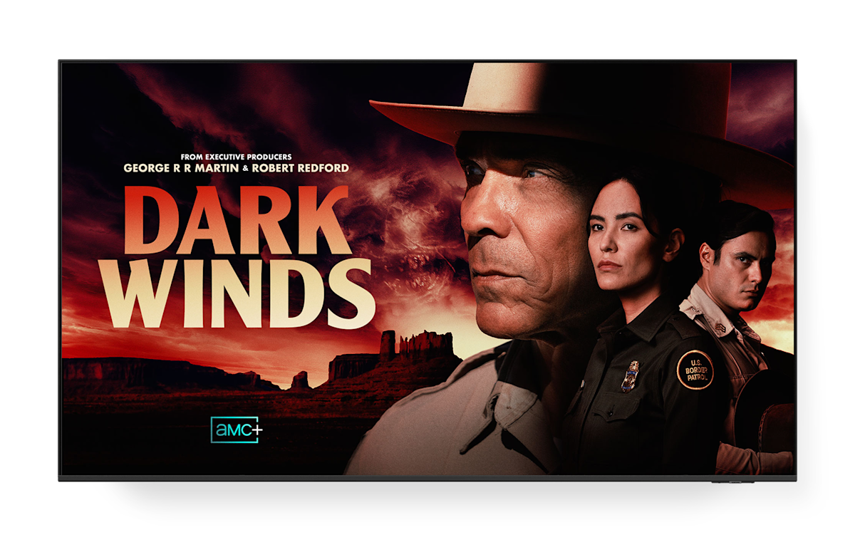A TV screen displaying the poster for Dark Winds on AMC+.