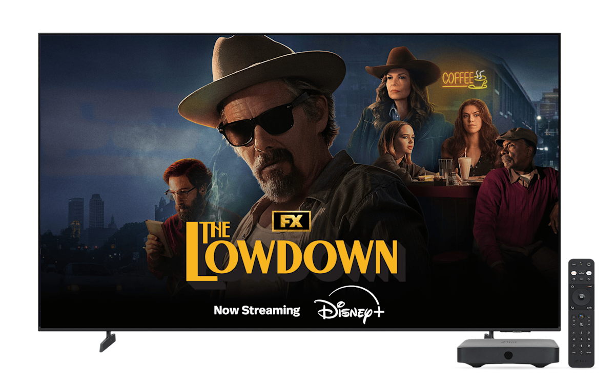 A poster of popular content streaming on Disney+; The Lowdown. A TV, TELUS TV Mini and a TV remote. The TV displays a poster of The Lowdown.