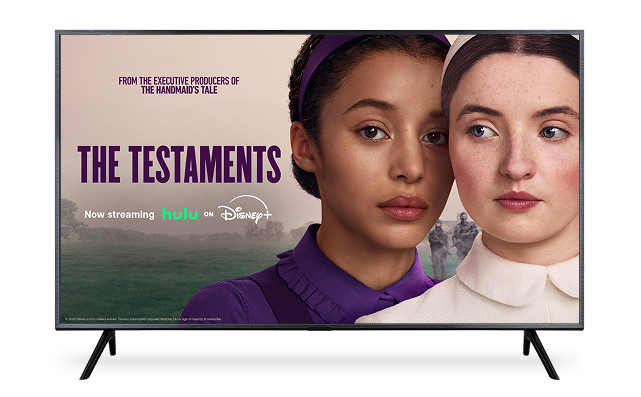 A TV displaying the poster for ‘The Testaments’ now streaming Hulu on Disney+.