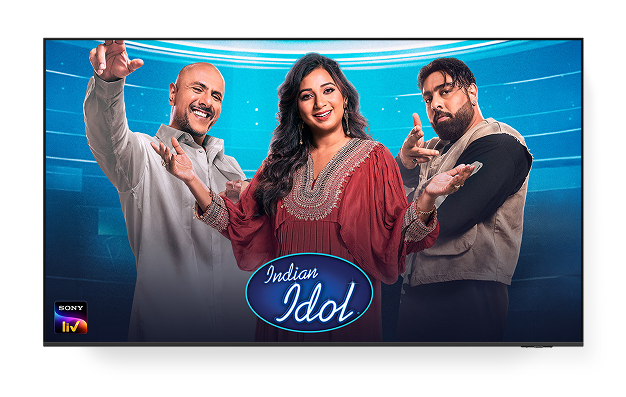 A TV displaying the 'Indian Idol' poster and the Sony LIV logo on the lower left corner.