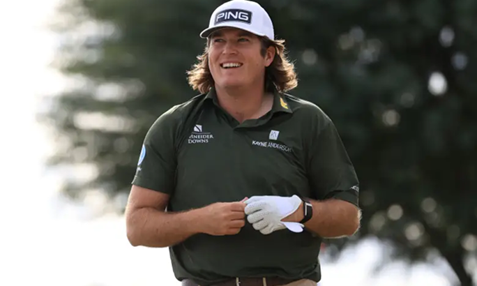 Golfer lining up a putt on the green