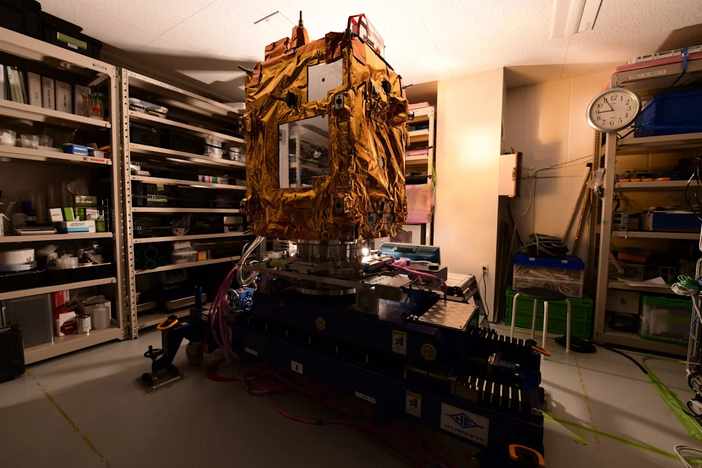 Photo of ADRAS-J in Cleanroom Dark Setting
