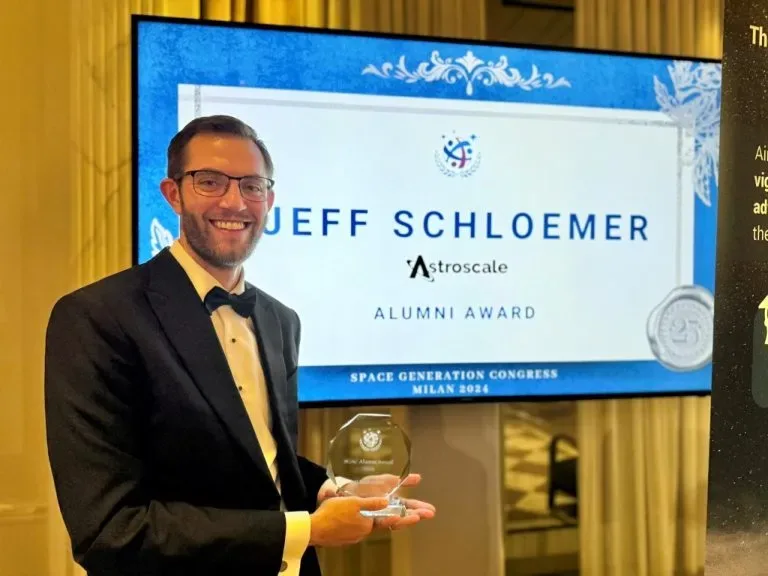 Schloemer accepting a prize