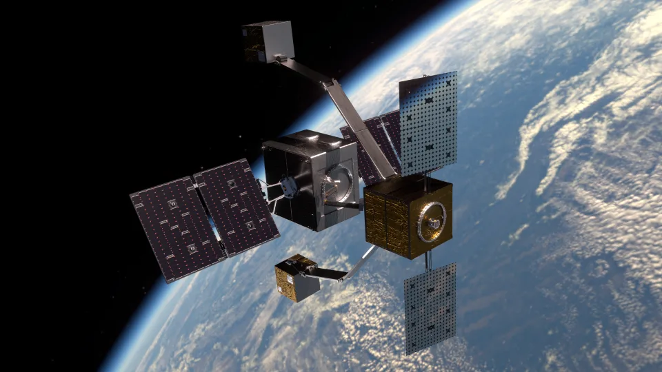 Satellite with solar panels and multiple components orbiting Earth, with the blue planet and cloud formations visible below.