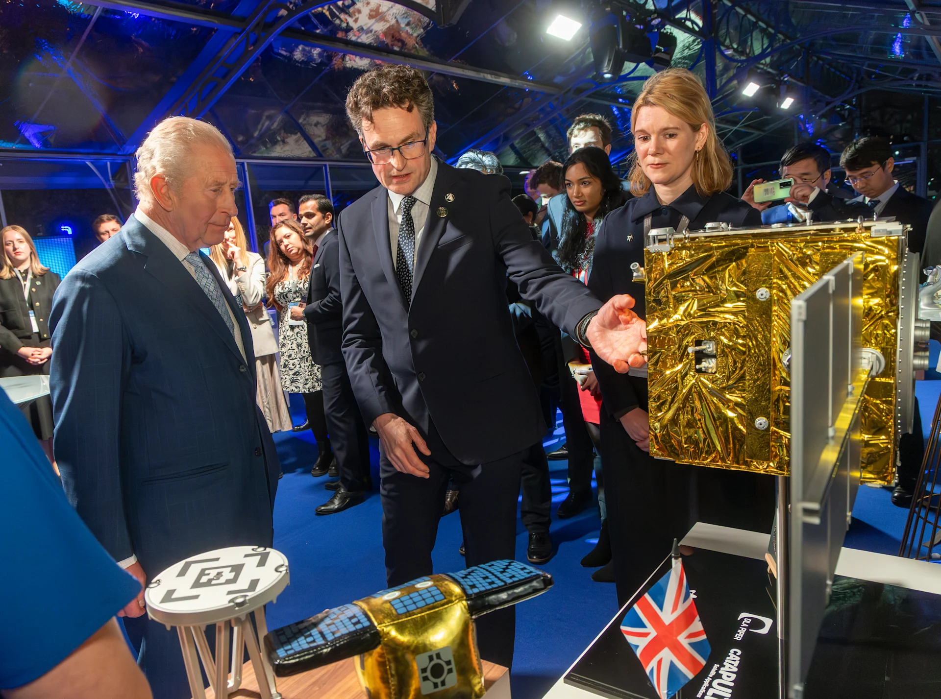 King Charles and Astroscale UK MD, Nick Shave, looking at a model of ELSA-M