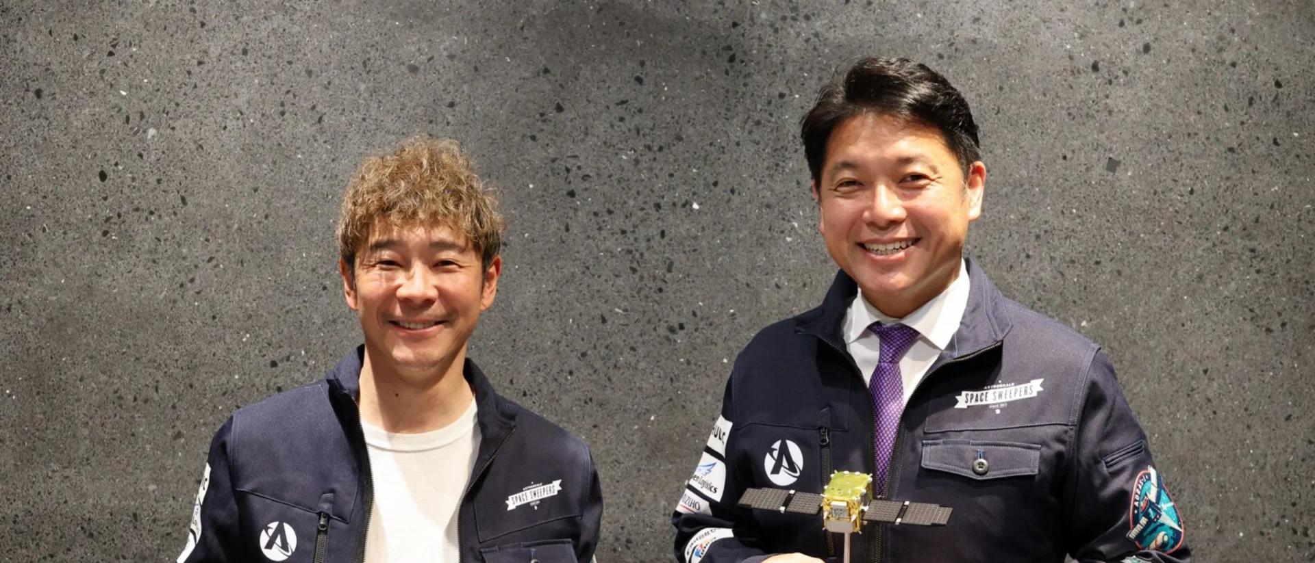 Yusaku Maezawa, the first private citizen to visit the International Space Station, with Nobu Okada, Founder & CEO of Astroscale.