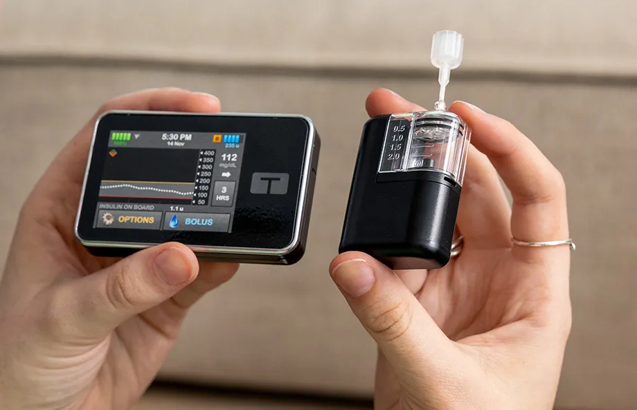 Tandem t:slim X2 insulin pump and Tandem Mobi system shown side by side