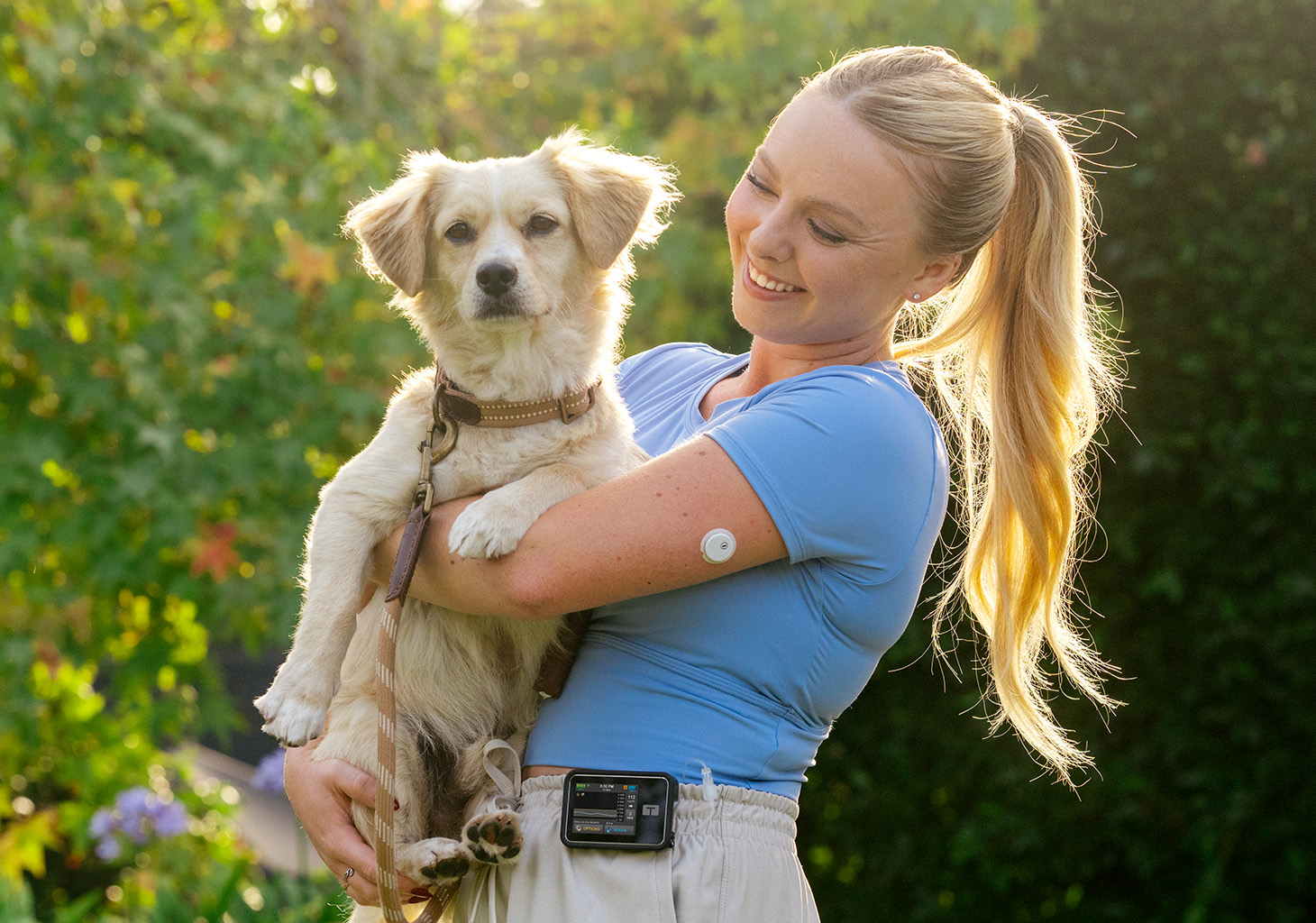 Woman Gardening while Wearing the t:slim X2 Insulin Pump and FreeStyle Libre 2 Plus Sensor